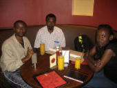In the Java House with Joseph Thiongo, fellow artist Ndichu Njuguna, and my wife